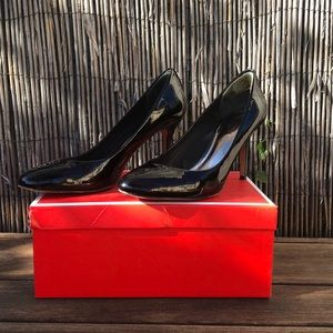 COACH Black patten leather pumps